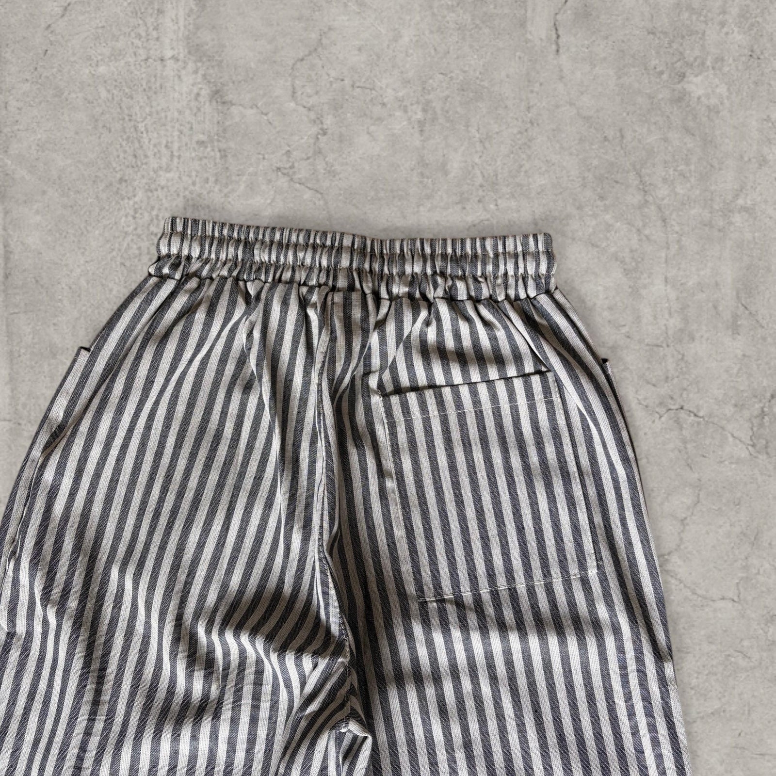 Vintage style baggy wide leg striped linen style trousers in grey/beige.