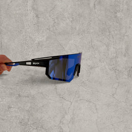 Insane sport sunglasses in black with blue purple reflective lenses. One size