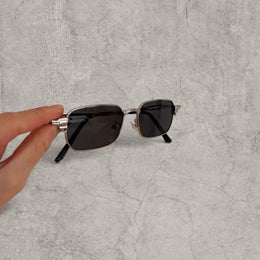 Insane UV400 sunglasses in silver grey with black lense. One size.