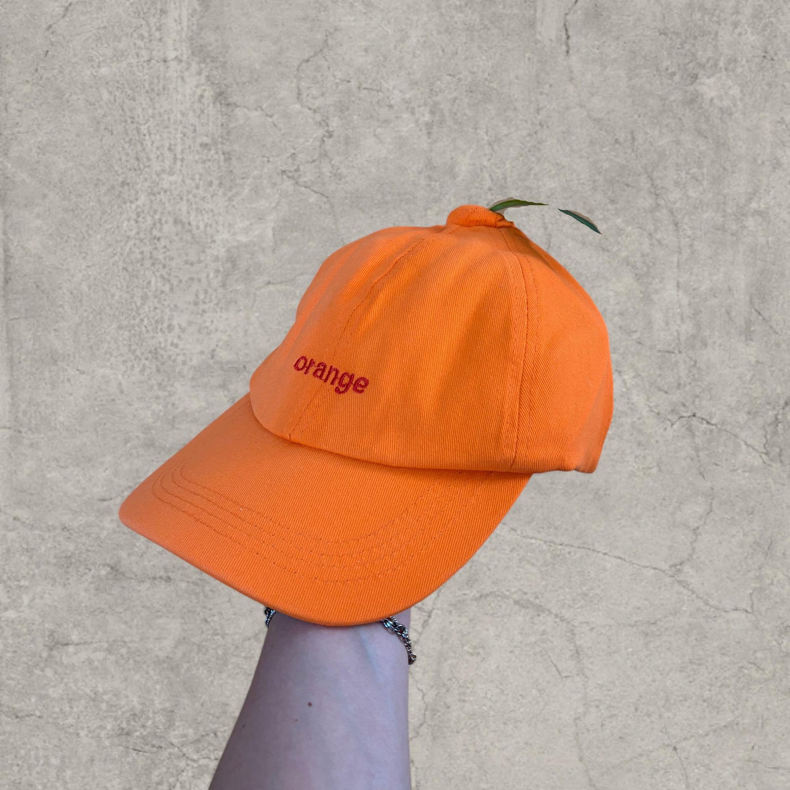 Vintage style baseball cap in orange with orange embroidered logo