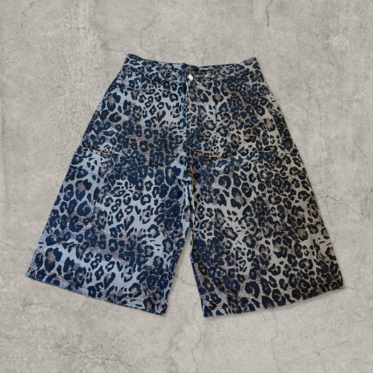 Brown beige denim jorts shorts with wide leg and leopard print pattern, front view