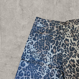Retro 90s denim skater leopard jorts shorts in brown.
