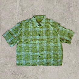 Cool boxy 90s style green checkered short sleeved shirt.