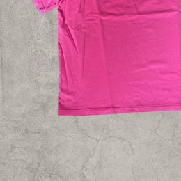 Battle vintage style T-shirt with back graphic in pink and black.