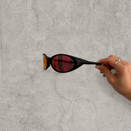 UV400 sunglasses with orange red reflective lens in black