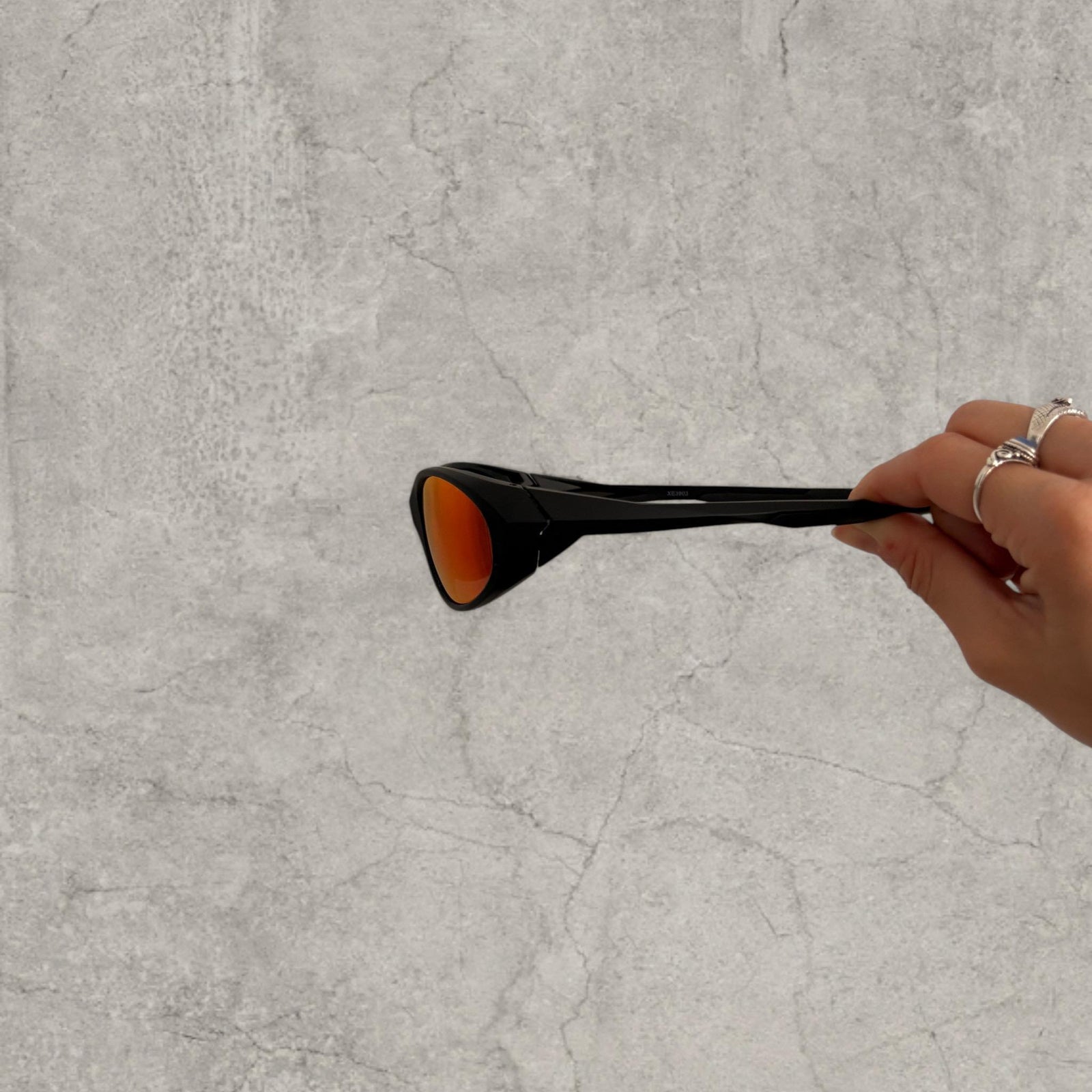 UV400 sunglasses with orange red reflective lens in black