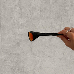 UV400 sunglasses with orange red reflective lens in black