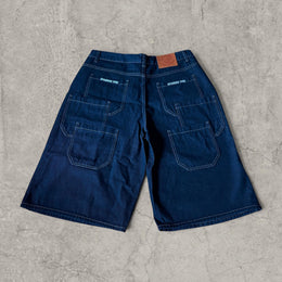 Retro 90s denim skater pocket jorts shorts in navy blue.