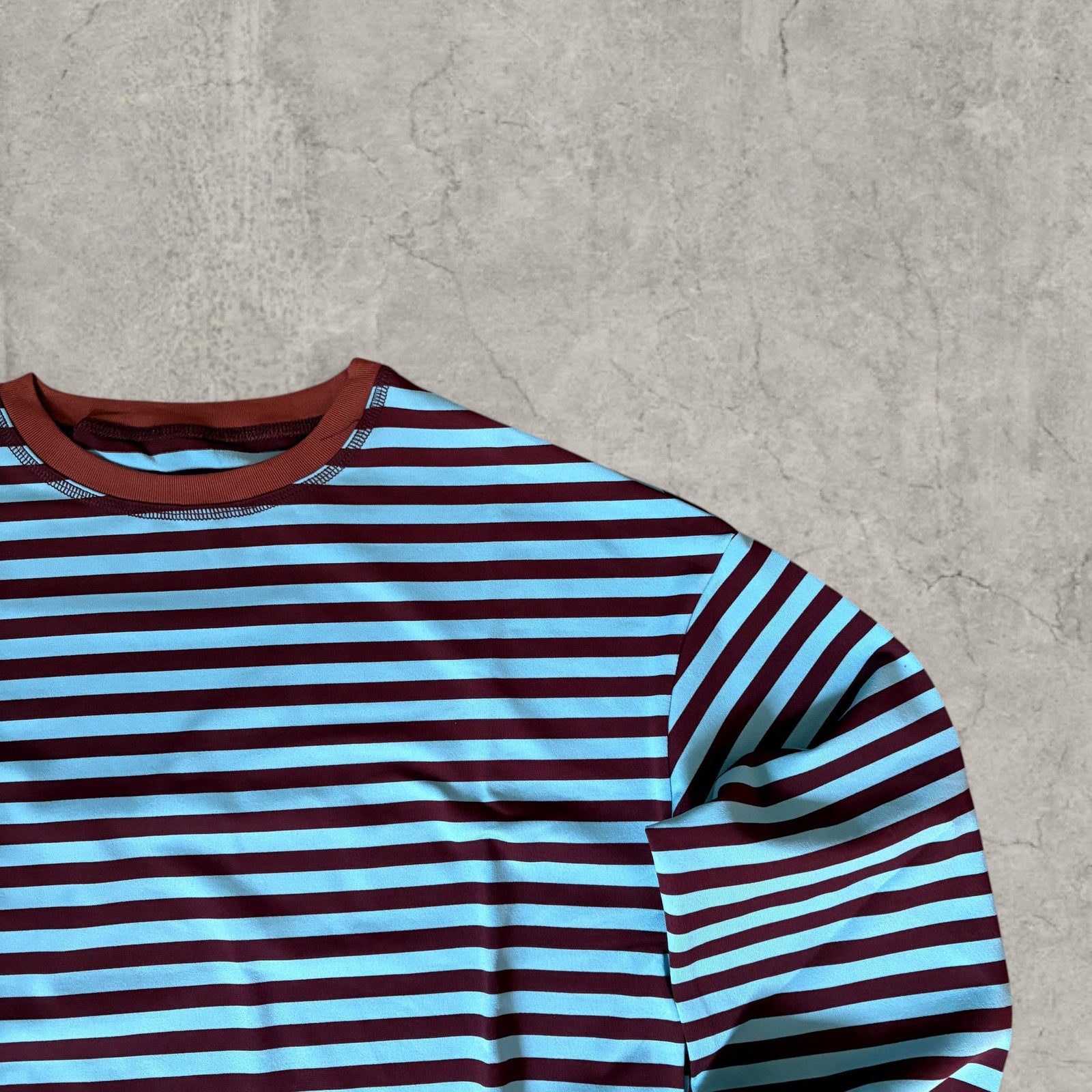 Vintage style relaxed fit long sleeve tshirt top in striped blue/brown.