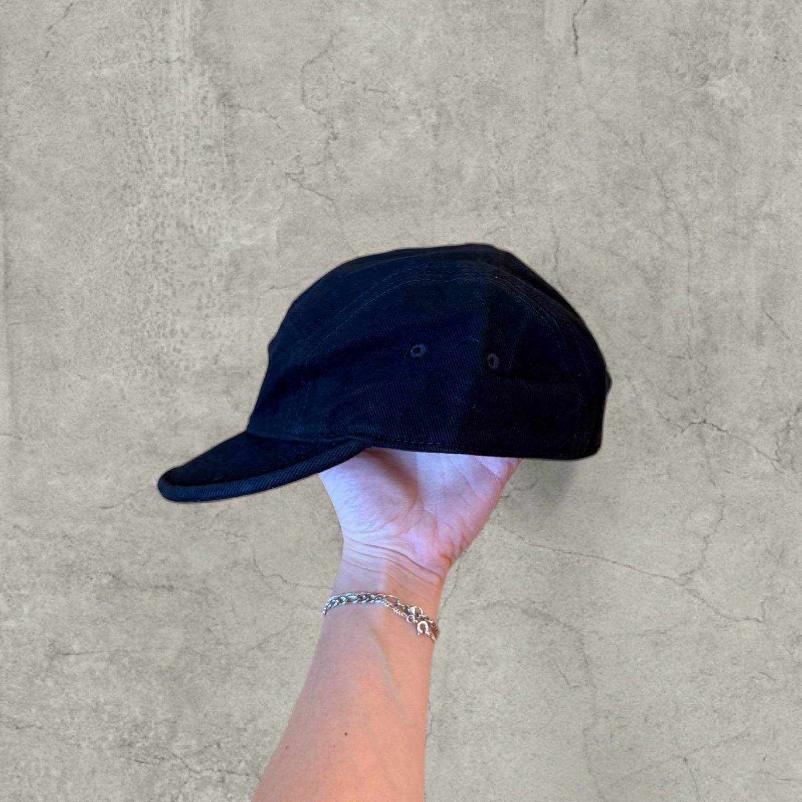 Vintage style baseball cap in black with red white Tennesse logo.