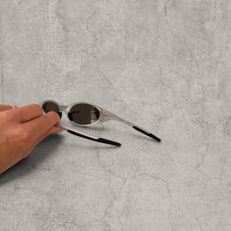 Insane UV400 sunglasses in silver with silver reflective lense. One size.