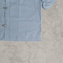 Checkered short sleeve shirt with metal clasps in scandinavian style in blue