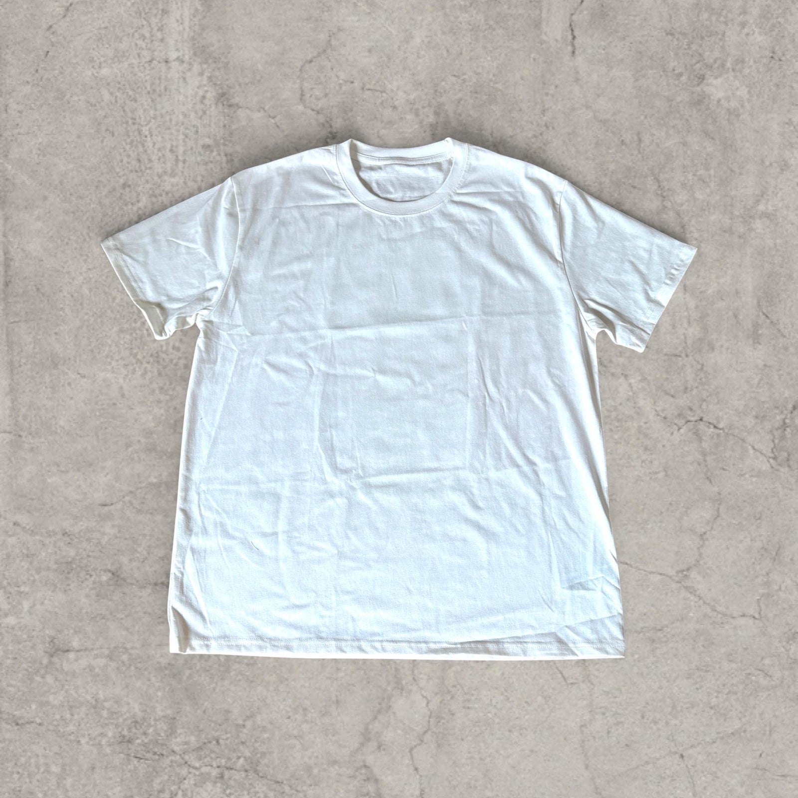 Butter vintage style T-shirt with front graphic in white with blue print.