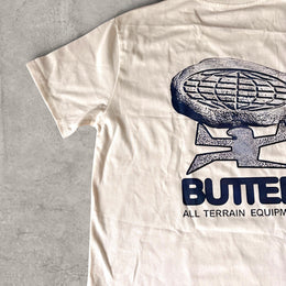 Butter vintage style T-shirt with front graphic in white with blue print.