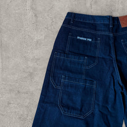 Retro 90s denim skater pocket jorts shorts in navy blue.