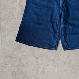 Retro 90s denim skater pocket jorts shorts in navy blue.