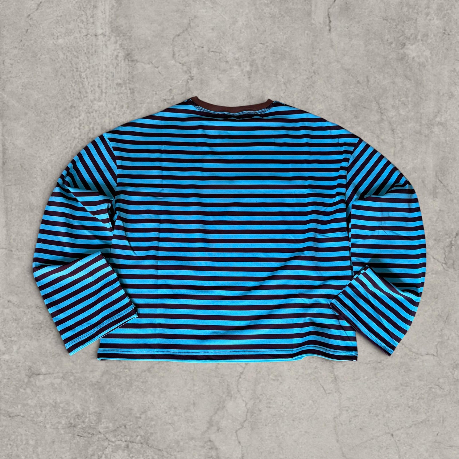Vintage style relaxed fit long sleeve tshirt top in striped blue/brown.