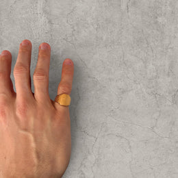 Cool vintage style gold colour stainless steel signet ring checkered detailing with square face.