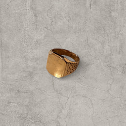 Cool vintage style gold colour stainless steel signet ring checkered detailing with square face.