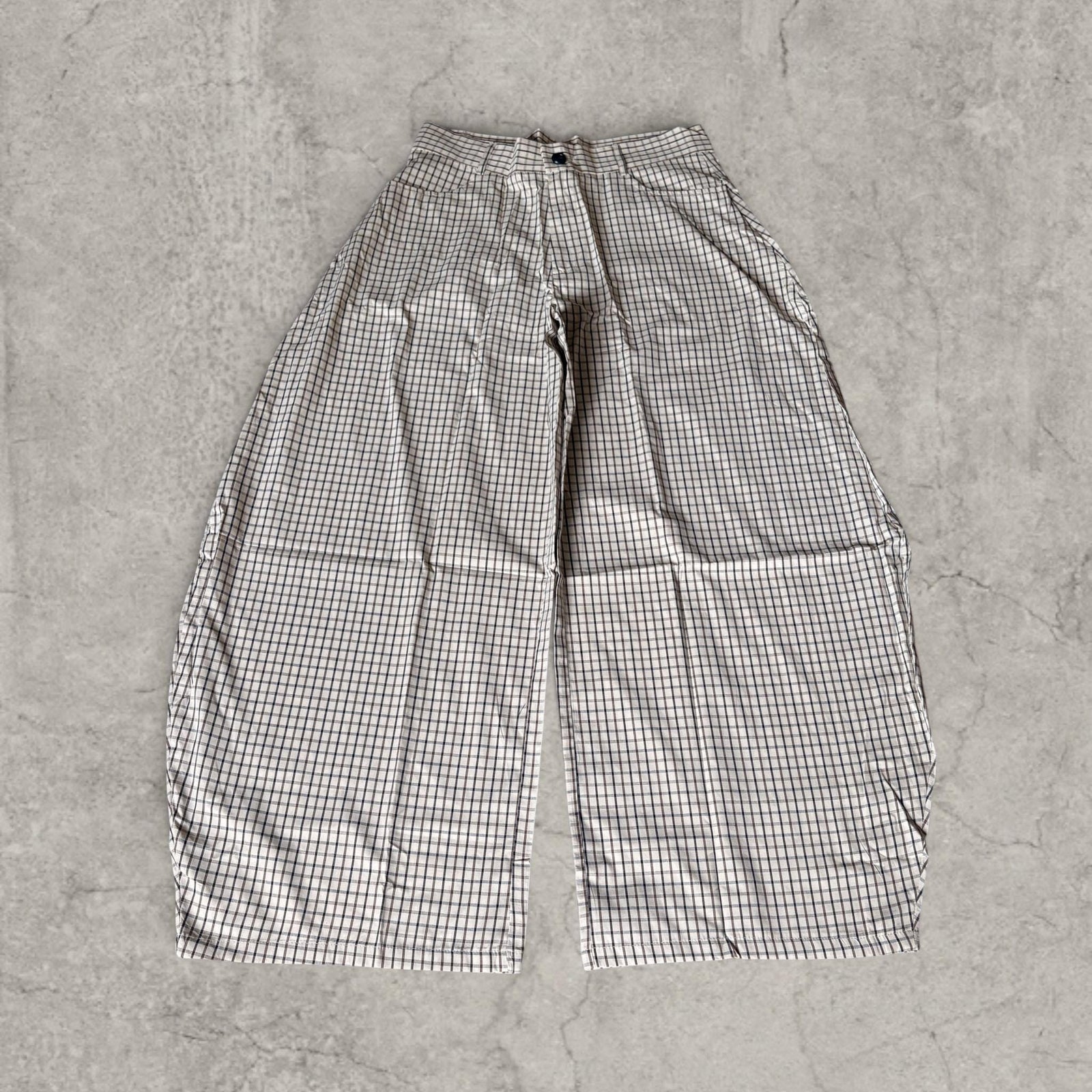 Wide-leg checkered trousers in cream and brown