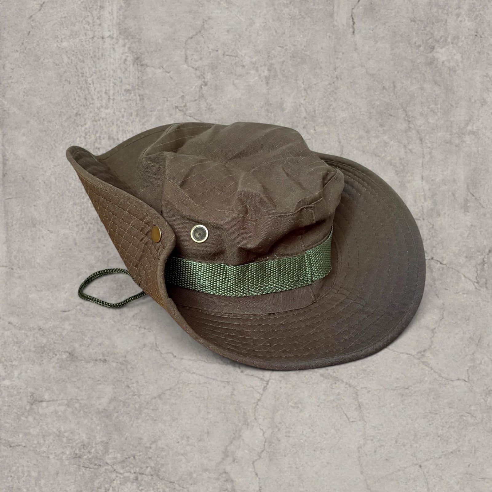 Vintage style Boonie jungle bucket hat with straps in khaki green. One size