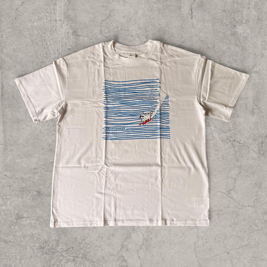 White loose fit T-shirt with blue surfing dog graphic on front