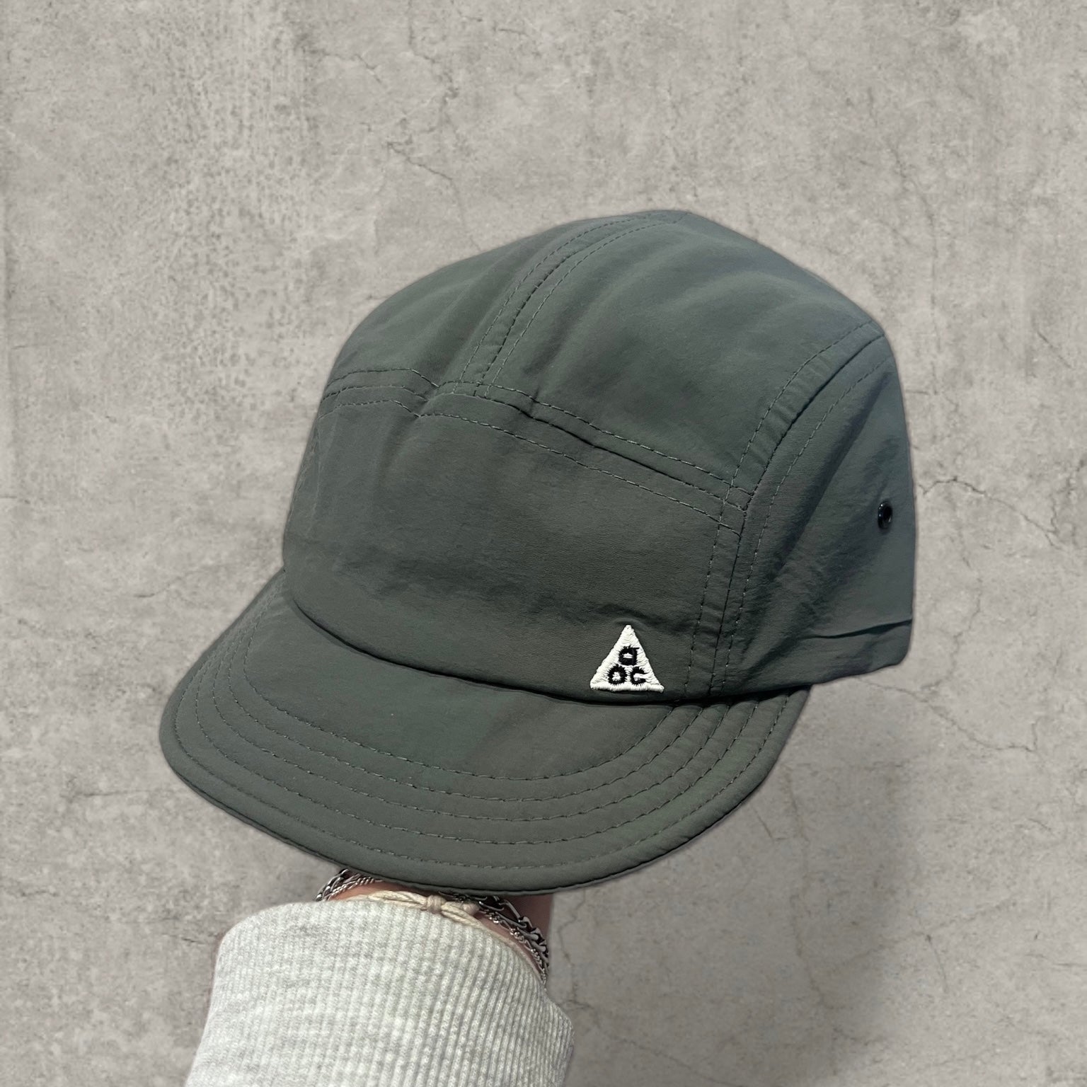 Water resistant Korean hiking cap in dark green