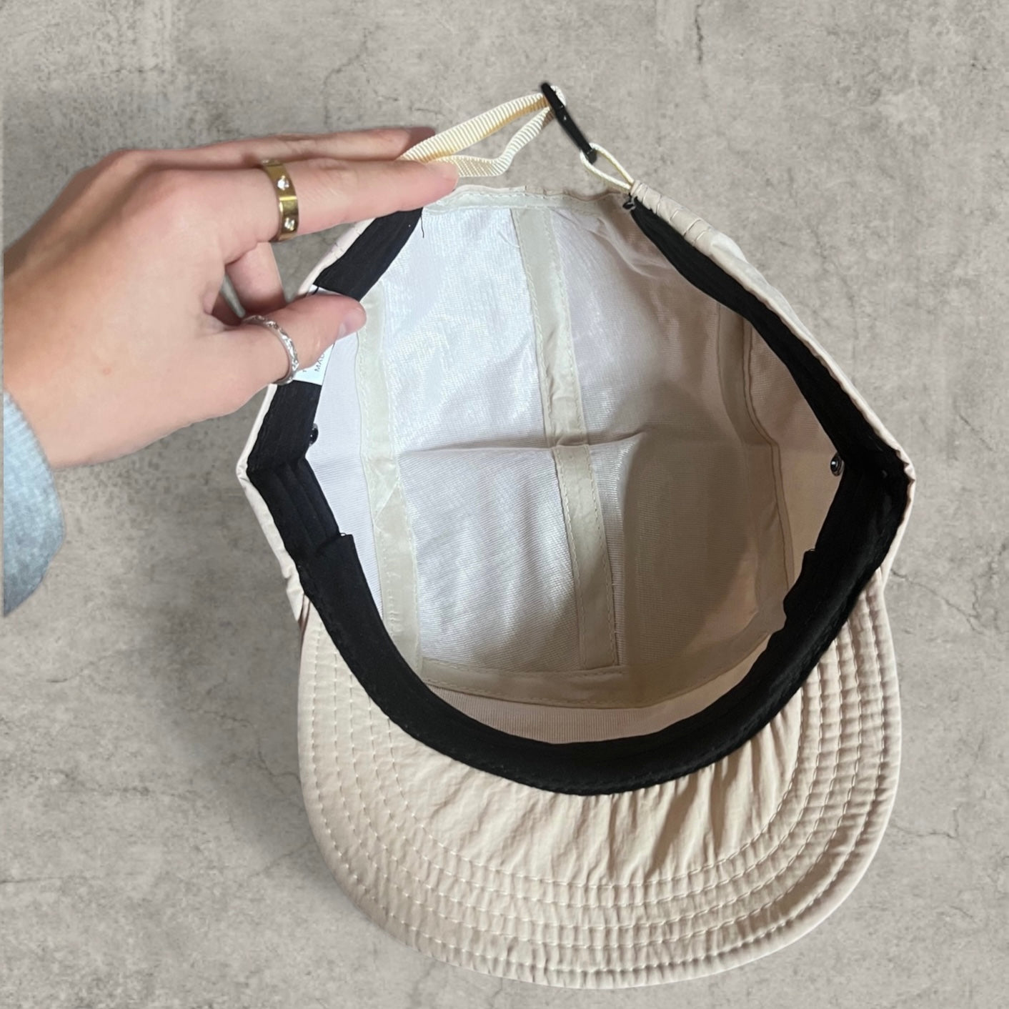 Outdoor hiking hat cap with triangular badge in cream