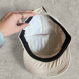 Outdoor hiking hat cap with triangular badge in cream