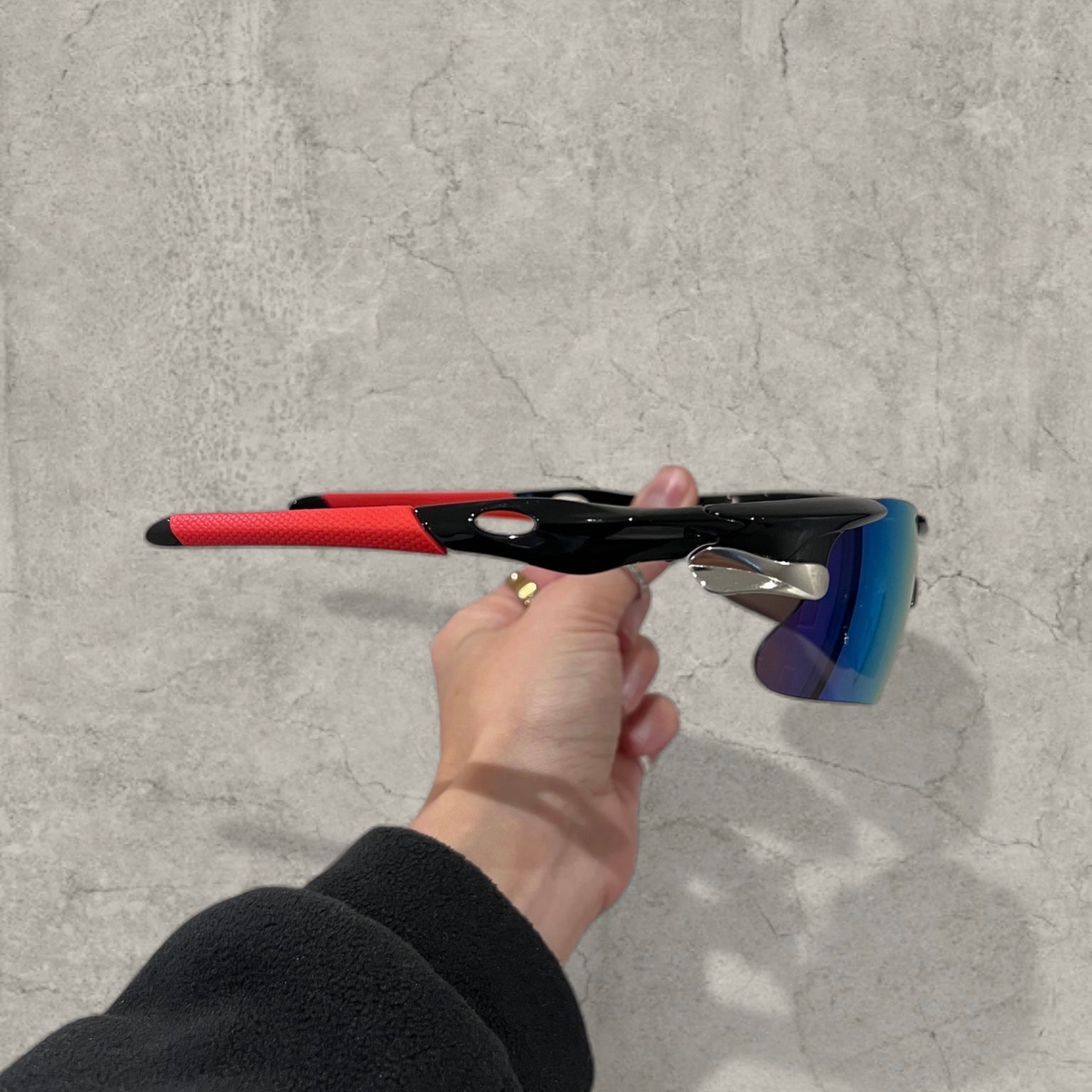 Sport sunglasses with blue and purple reflective lenses in black